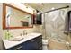 Updated bathroom with modern vanity, stylish fixtures, and decorative shower curtain at 4717 Cobblestone Ln. # B3, Myrtle Beach, SC 29577