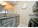 This eat-in kitchen features stainless steel appliances, granite countertops, and bright natural light at 4717 Cobblestone Ln. # B3, Myrtle Beach, SC 29577