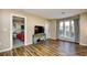 Open living area with modern flooring, a view to bedroom, and ample natural light at 4717 Cobblestone Ln. # B3, Myrtle Beach, SC 29577