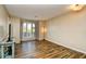 Bright living room with wood-look floors and a cozy atmosphere at 4717 Cobblestone Ln. # B3, Myrtle Beach, SC 29577