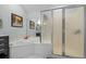 Relaxing bathroom with a soaking tub, shower, and neutral decor, creating a peaceful and functional space at 4856 Bermuda Way N, Myrtle Beach, SC 29577