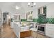 Contemporary kitchen featuring a center island, stainless steel appliances and vibrant backsplash for a modern look at 4856 Bermuda Way N, Myrtle Beach, SC 29577