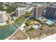 Aerial view of resort with multiple pools and water features at 491 Ocean Creek Dr. # 2613, Myrtle Beach, SC 29572