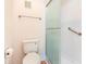 Bathroom featuring a toilet and walk-in shower with grab bar at 491 Ocean Creek Dr. # 2613, Myrtle Beach, SC 29572