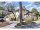 Two-story condo building with well-maintained landscaping, exterior stairs to the upper units, and inviting entryways at 491 Ocean Creek Dr. # 2613, Myrtle Beach, SC 29572