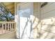 Close-up of the front door of unit #2613, featuring a glass panel and a painted unit number sign at 491 Ocean Creek Dr. # 2613, Myrtle Beach, SC 29572