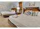 Bright bedroom with two queen beds, coastal decor, and beachy artwork at 4934 Salt Creek Ct., North Myrtle Beach, SC 29582
