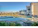 Water view of the resort with view of lake, landscape and hotel buildings at 4934 Salt Creek Ct., North Myrtle Beach, SC 29582
