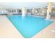 Bright and airy indoor pool with ample natural light and clear blue water at 4934 Salt Creek Ct., North Myrtle Beach, SC 29582