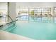 Inviting indoor pool with a calming atmosphere and plenty of lounge chairs at 4934 Salt Creek Ct., North Myrtle Beach, SC 29582