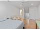 Bedroom with ensuite bath, ceiling fan and comfortable seating area at 5077 Capulet Circle, Myrtle Beach, SC 29588