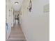 Hallway with wood-look floors leading to living area at 510 Fairwood Lakes Ln. # 20E, Myrtle Beach, SC 29588
