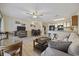Open-concept living room adjacent to modern kitchen and comfortable seating at 510 Fairwood Lakes Ln. # 20E, Myrtle Beach, SC 29588