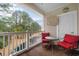 Cozy screened-in balcony featuring comfortable seating with a view of the waterway at 5825 Catalina Dr. # 531, North Myrtle Beach, SC 29582
