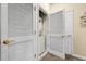 Convenient laundry closet featuring a stacked washer and dryer unit and ample storage at 5825 Catalina Dr. # 531, North Myrtle Beach, SC 29582