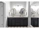 Elegant bathroom with a double vanity, decorative mirrors, and plenty of counter space at 5834 Longwood Dr. # 303, Murrells Inlet, SC 29576
