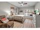 Inviting bedroom featuring a queen bed, neutral decor, and a window with natural light at 5834 Longwood Dr. # 303, Murrells Inlet, SC 29576