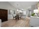 Open-concept dining area with stylish table set and sleek flooring at 5834 Longwood Dr. # 303, Murrells Inlet, SC 29576