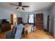 Spacious bedroom with hardwood floors, a ceiling fan, and plenty of storage space at 5865 Creekside Dr., Myrtle Beach, SC 29588