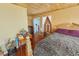 Cozy bedroom with wood floors, boat shelf and bedside table at 5865 Creekside Dr., Myrtle Beach, SC 29588
