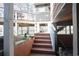 Stairs leading to the back of the home with views of the lake in the background at 5865 Creekside Dr., Myrtle Beach, SC 29588