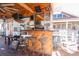 Charming outdoor bar with ample seating, counter space and views of the water at 5865 Creekside Dr., Myrtle Beach, SC 29588