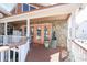 Spacious side porch with stone accents, offering ample room for outdoor seating and storage at 5865 Creekside Dr., Myrtle Beach, SC 29588