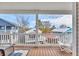 Covered balcony with seating and views of the surrounding neighborhood at 6001-N50 S Kings Hwy., Myrtle Beach, SC 29575