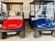 View of golf carts stored in the parking space under the elevated home at 6001 - N50 S Kings Hwy., Myrtle Beach, SC 29575