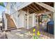 Inviting backyard space with outdoor shower, stairs, and wooden deck at 6001-Z-26 South Kings Hwy., Myrtle Beach, SC 29575