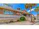 Exterior shot of the Sands Harbor Gathering Fun Center, a low-rise building with landscaping at 6001-Z-26 South Kings Hwy., Myrtle Beach, SC 29575