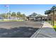 Welcoming community entrance with palm trees, clean asphalt and clear signage for easy navigation at 6001-Z-26 South Kings Hwy., Myrtle Beach, SC 29575