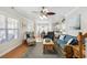Bright living room flows into dining area with a glimpse of the kitchen, offering a seamless open layout at 6001-Z-26 South Kings Hwy., Myrtle Beach, SC 29575