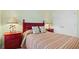 The bedroom features coordinating bedside tables, lamps, and palm tree-themed decor at 606 5Th Ave. S, North Myrtle Beach, SC 29582