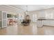 Elegant dining area with tile floors, shuttered windows, and sliding doors to an outdoor patio at 606 5Th Ave. S, North Myrtle Beach, SC 29582