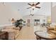 Expansive living space with tile flooring, ceiling fans, and an open layout, perfect for Gathering gatherings at 606 5Th Ave. S, North Myrtle Beach, SC 29582