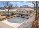 Wide aerial perspective of a two-story home with a large driveway, showcasing the surrounding neighborhood at 613 Calhoun Dr., Murrells Inlet, SC 29576