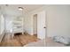 Guest bedroom featuring wood-look floors, bunk beds and twin bed at 613 Calhoun Dr., Murrells Inlet, SC 29576