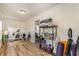 Spacious bonus room featuring hardwood floors, a large mirror, and plenty of storage space at 613 Calhoun Dr., Murrells Inlet, SC 29576