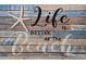 Beach themed decor of a starfish and the saying 'Life is Better at the Beach' at 613 Calhoun Dr., Murrells Inlet, SC 29576