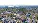 Aerial view displaying the townhouse complex, mature trees, and the surrounding neighborhood at 614 15Th Ave. S # 42, Surfside Beach, SC 29575