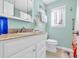 Bathroom featuring a vanity with a granite countertop, a toilet, and decor at 614 15Th Ave. S # 42, Surfside Beach, SC 29575