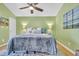 Bright bedroom with blue accents, decorative pillows, and stylish lamps at 614 15Th Ave. S # 42, Surfside Beach, SC 29575