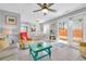 Comfortable living room with a dining nook, sliding glass doors, and coastal accents at 614 15Th Ave. S # 42, Surfside Beach, SC 29575