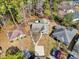 An aerial perspective showing homes with mature trees, well-defined property lines, and a tidy neighborhood layout at 6634 Cinnamon Fern Ln., Myrtle Beach, SC 29588