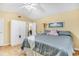Bright bedroom with a large closet and cozy bedding at 6634 Cinnamon Fern Ln., Myrtle Beach, SC 29588