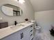 Clean bathroom featuring modern sink and vanity with white walls and bright lighting at 6636 Breezewood Blvd., Myrtle Beach, SC 29588