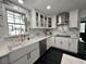 Well-appointed kitchen featuring marble countertops, stainless steel appliances, and ample cabinet space at 6636 Breezewood Blvd., Myrtle Beach, SC 29588