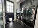 Convenient laundry room with modern washer and dryer units and a view to the outdoors at 6636 Breezewood Blvd., Myrtle Beach, SC 29588
