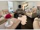 Inviting living room with plush seating, neutral tones, and an open layout to the staircase at 6636 Breezewood Blvd., Myrtle Beach, SC 29588